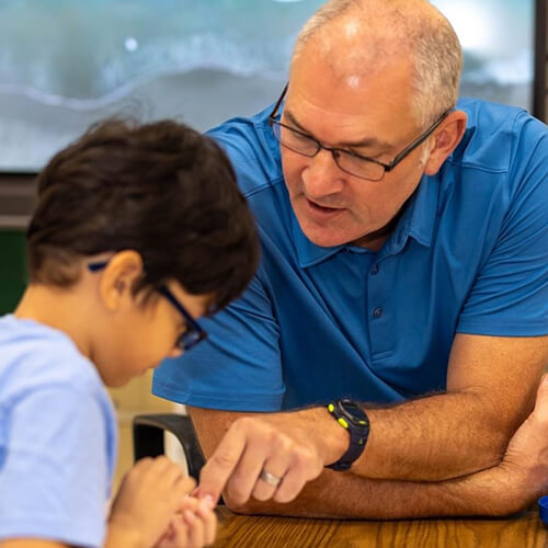 jeff mentoring a young boy