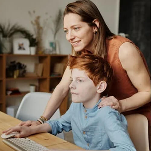 mom and kid at computer
